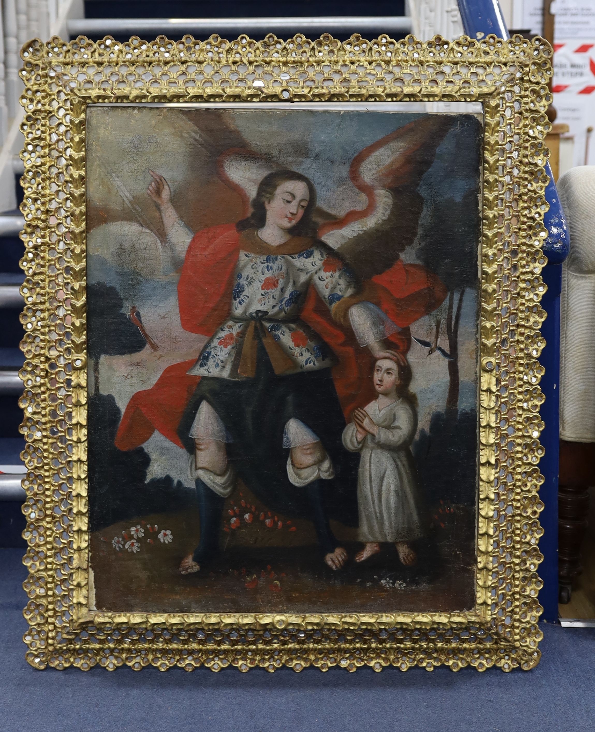 Cusco School, oil on canvas, Archangel and child in a landscape, 79 x 60cm, ornate mirrored frame